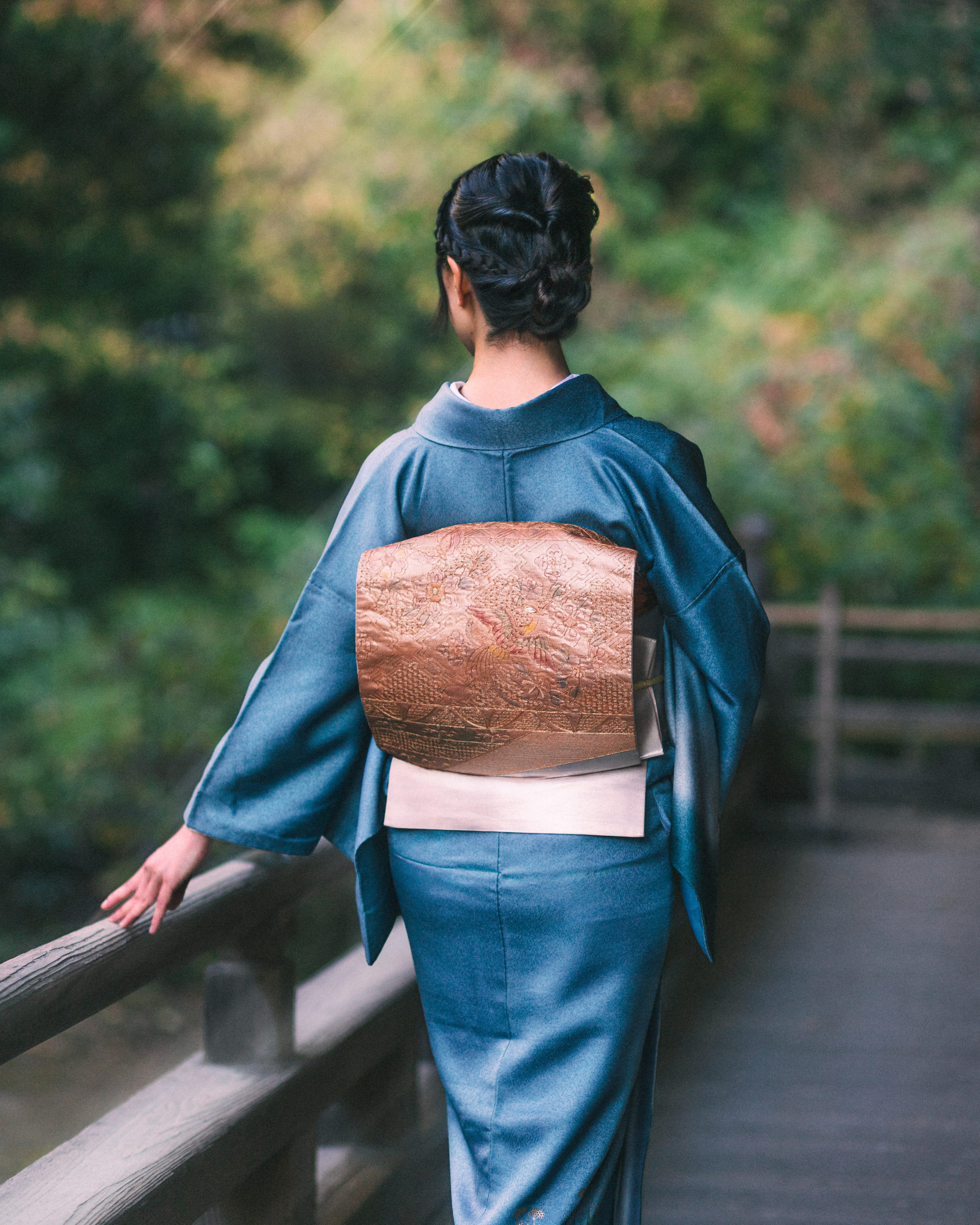 Back view of kimono with embroidered obi during photoshoot in Kamakura